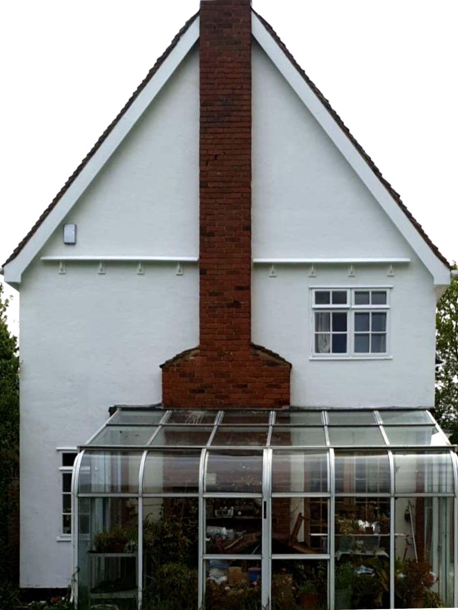 Listed residential property after external renovation by Nationserv showing new render and joinery