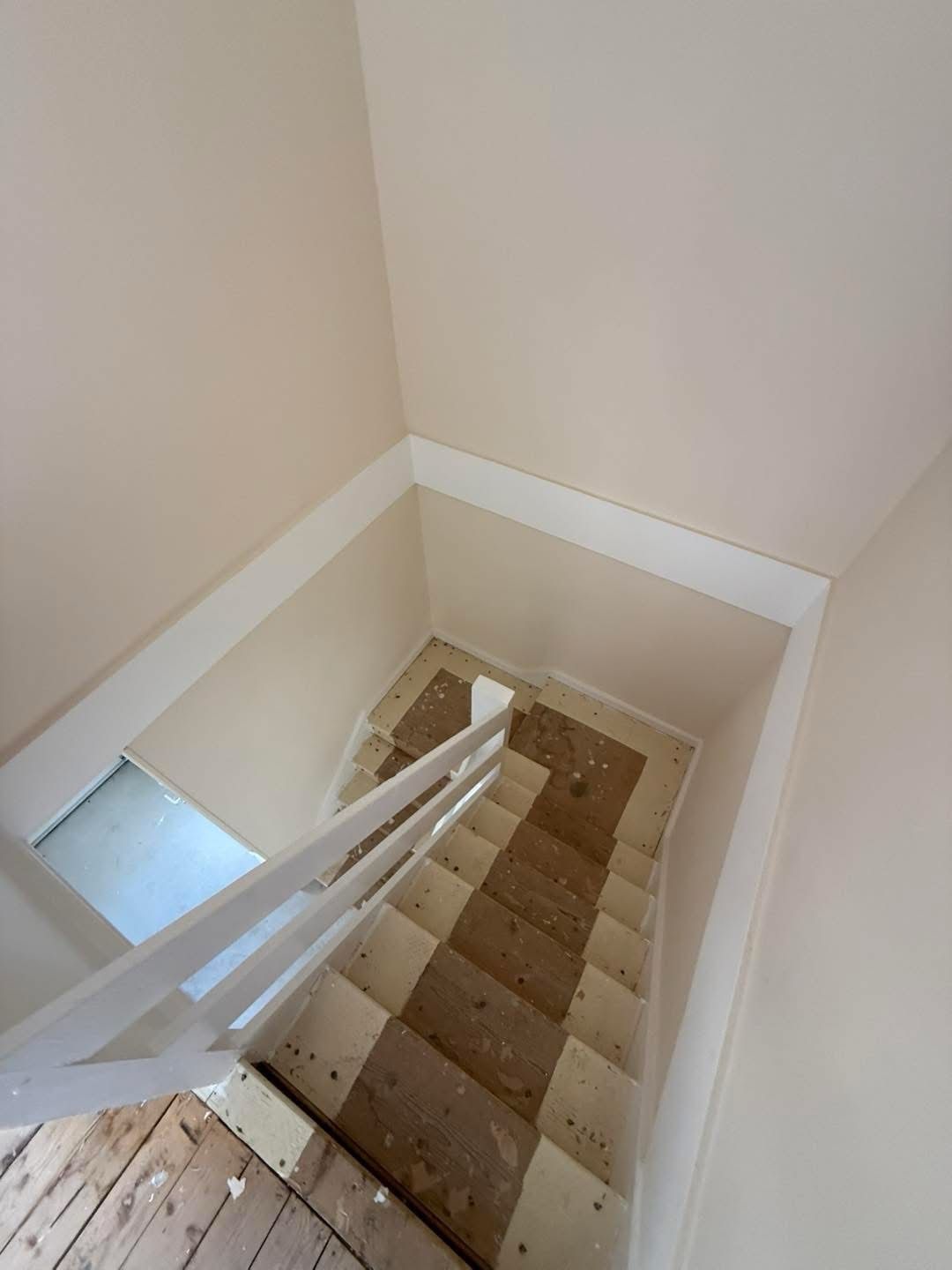 Stairs before carpet fit, bare wood