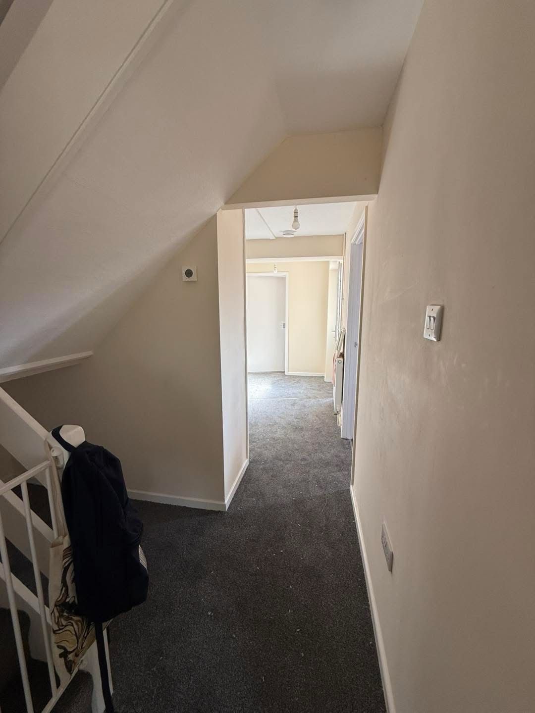 Hallway after, carpet fitted by Nationserv