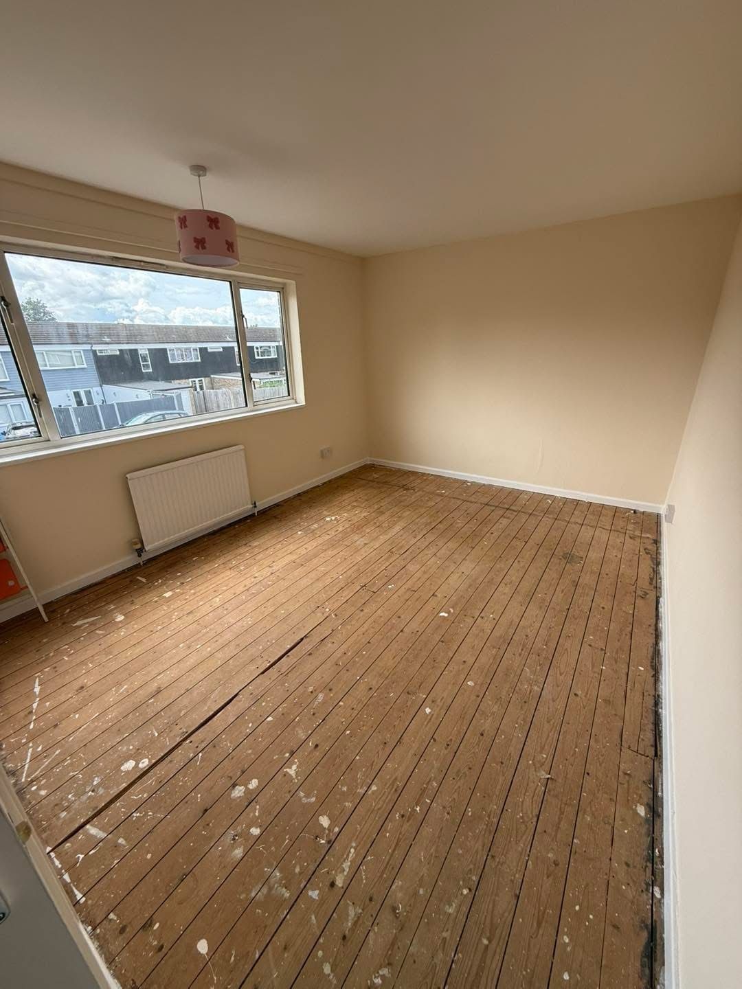 Bare floorboards before flooring fit