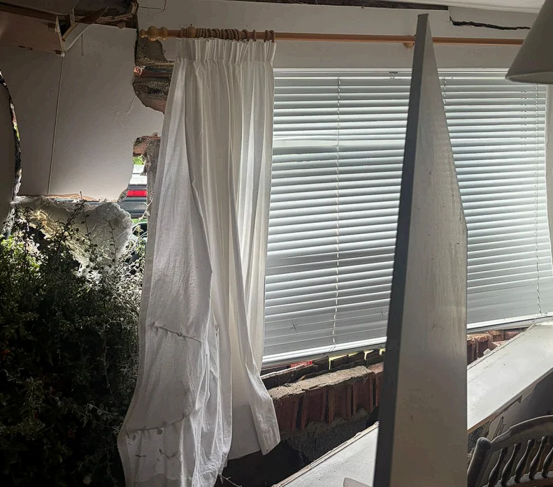 Internal damage visible from inside the Oxford property after the vehicle impact
